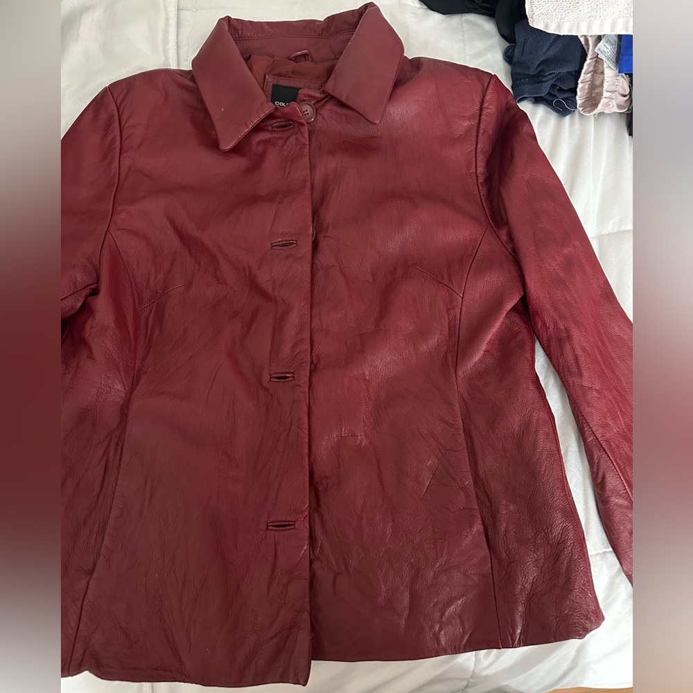 I am selling this burgundy leather jacket! Nothing wrong with it